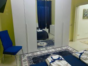 Postel nebo postele na pokoji v ubytování B&B Smeraldo