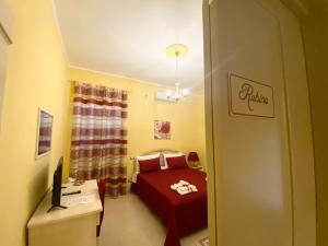 Postel nebo postele na pokoji v ubytování B&B Smeraldo