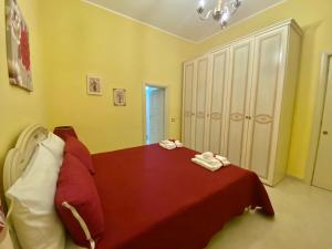 Postel nebo postele na pokoji v ubytování B&B Smeraldo