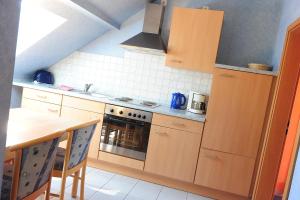 Köök või kööginurk majutusasutuses Gasthaus Jütte