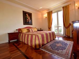 Posteľ alebo postele v izbe v ubytovaní Apartment in Franciacorta near Lake Iseo