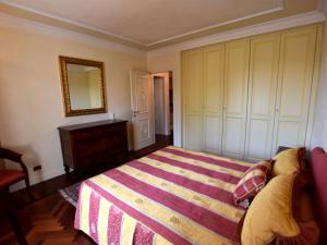 Posteľ alebo postele v izbe v ubytovaní Apartment in Franciacorta near Lake Iseo