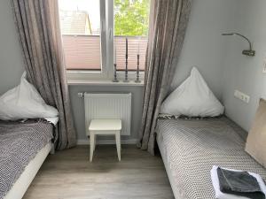 Postel nebo postele na pokoji v ubytování Haus Elfi