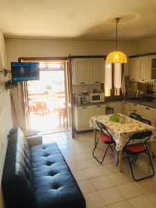 Kuchyň nebo kuchyňský kout v ubytování Sardegna-Ferienwohnung mit emotionale Meeres Blick