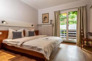 Letto o letti in una camera di Hotel Heintz