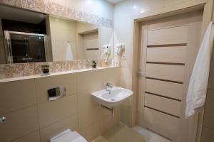Et badeværelse på Apartament Feniks 12 - 63 m2