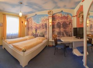 Postel nebo postele na pokoji v ubytování Hotel Plankl