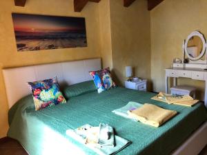 A bed or beds in a room at B&B Fior di Loto