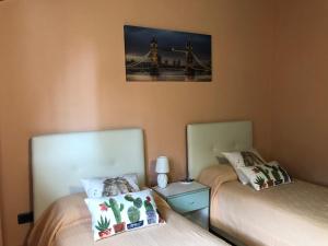 A bed or beds in a room at B&B Fior di Loto