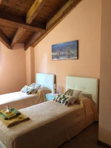 A bed or beds in a room at B&B Fior di Loto