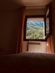 Letto o letti in una camera di Hotel Parco Nazionale