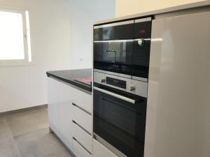 Kuchyňa alebo kuchynka v ubytovaní Villa Rafaela