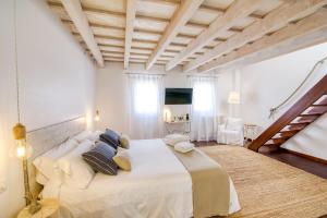 Postel nebo postele na pokoji v ubytování Hotel Ca S'Arader Turismo de Interior