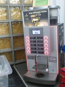 a machine is sitting on the floor in a store at Casa David in Buşteni