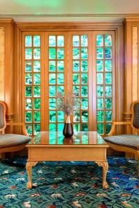 a room with a table with a vase on it at Oran Hotel in Istanbul