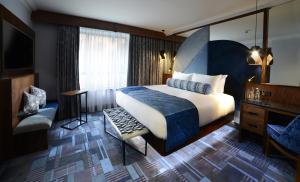 Voodi või voodid majutusasutuse Arthaus Hotel toas