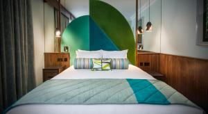 Voodi või voodid majutusasutuse Arthaus Hotel toas
