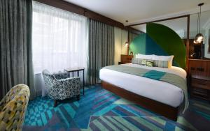 Voodi või voodid majutusasutuse Arthaus Hotel toas