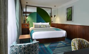 Voodi või voodid majutusasutuse Arthaus Hotel toas