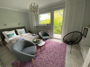 Posteľ alebo postele v izbe v ubytovaní Blue Sky Apartament