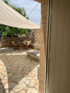 Patio nebo venkovní prostory v ubytování Keramoto Cottage