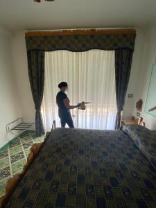 Postel nebo postele na pokoji v ubytování Riviera B&B Rooms