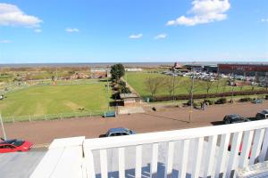 a view of a parking lot with a park at The Grand Hotel in Skegness
