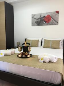 Postel nebo postele na pokoji v ubytování Appartamenti Michelino