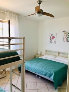 En eller flere senge i et værelse på Appartamenti Venere