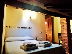 Posteľ alebo postele v izbe v ubytovaní Casa rural La Villa