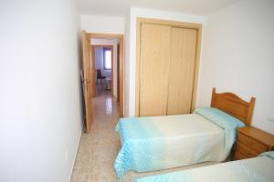 Postel nebo postele na pokoji v ubytování Apartamento oroblanc