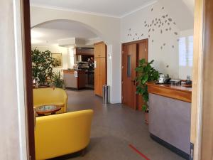 Kuchyň nebo kuchyňský kout v ubytování Hotel Cavour