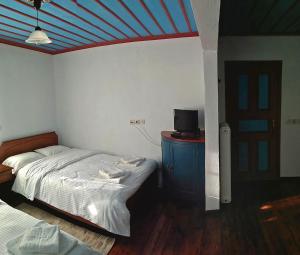 Postel nebo postele na pokoji v ubytování Guesthouse Iro