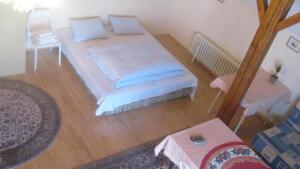 Postel nebo postele na pokoji v ubytování Apartmány Sedmikráska