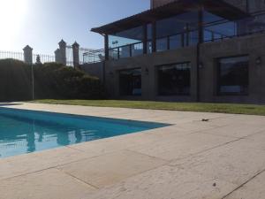 Bazén v ubytování Hotel Villadesella nebo v jeho okolí