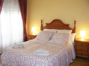 Posteľ alebo postele v izbe v ubytovaní Casa Antuña