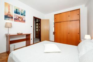 Postel nebo postele na pokoji v ubytování Apartments Anamarija