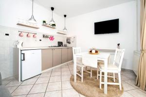 Kuchyň nebo kuchyňský kout v ubytování Apartments Anamarija