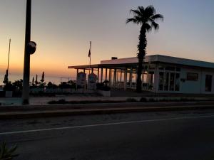 The sunrise or sunset as seen from a panziókat or nearby