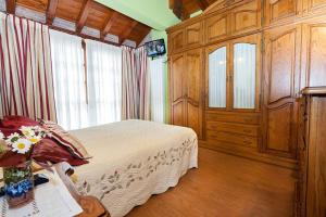 Een bed of bedden in een kamer bij Viviendas La Campa