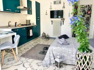 Kuchyň nebo kuchyňský kout v ubytování B&B Le Statuine