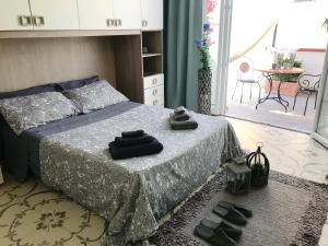 Postel nebo postele na pokoji v ubytování B&B Le Statuine