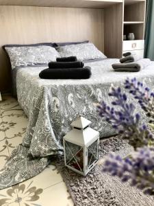 Postel nebo postele na pokoji v ubytování B&B Le Statuine