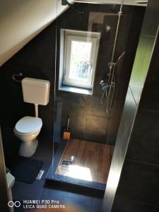 Kúpeľňa v ubytovaní Renáta Apartman