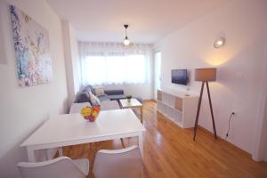 TV a/nebo společenská místnost v ubytování Sun Apartments