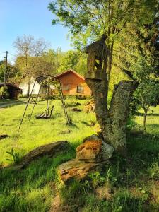 Vonkajšia záhrada v ubytovaní Dřevěný prázdninový domek SUNRISE