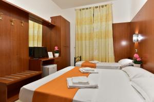 Posteľ alebo postele v izbe v ubytovaní B&B Termini