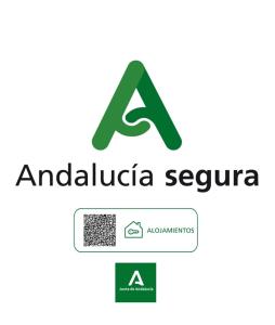 un logotipo con las letras y el servicio de ambulancias en Casa Rural Los Pinos, en Hinojos