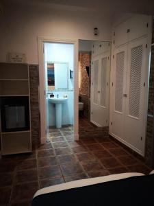 Vonios kambarys apgyvendinimo įstaigoje Hostal Costa De La Luz