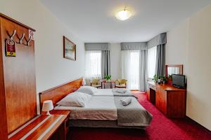 Postel nebo postele na pokoji v ubytování Panorama_SPA